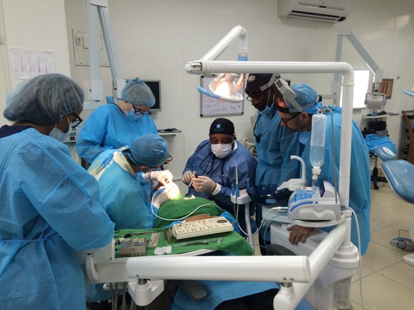 Faculty leading live-patient surgical training