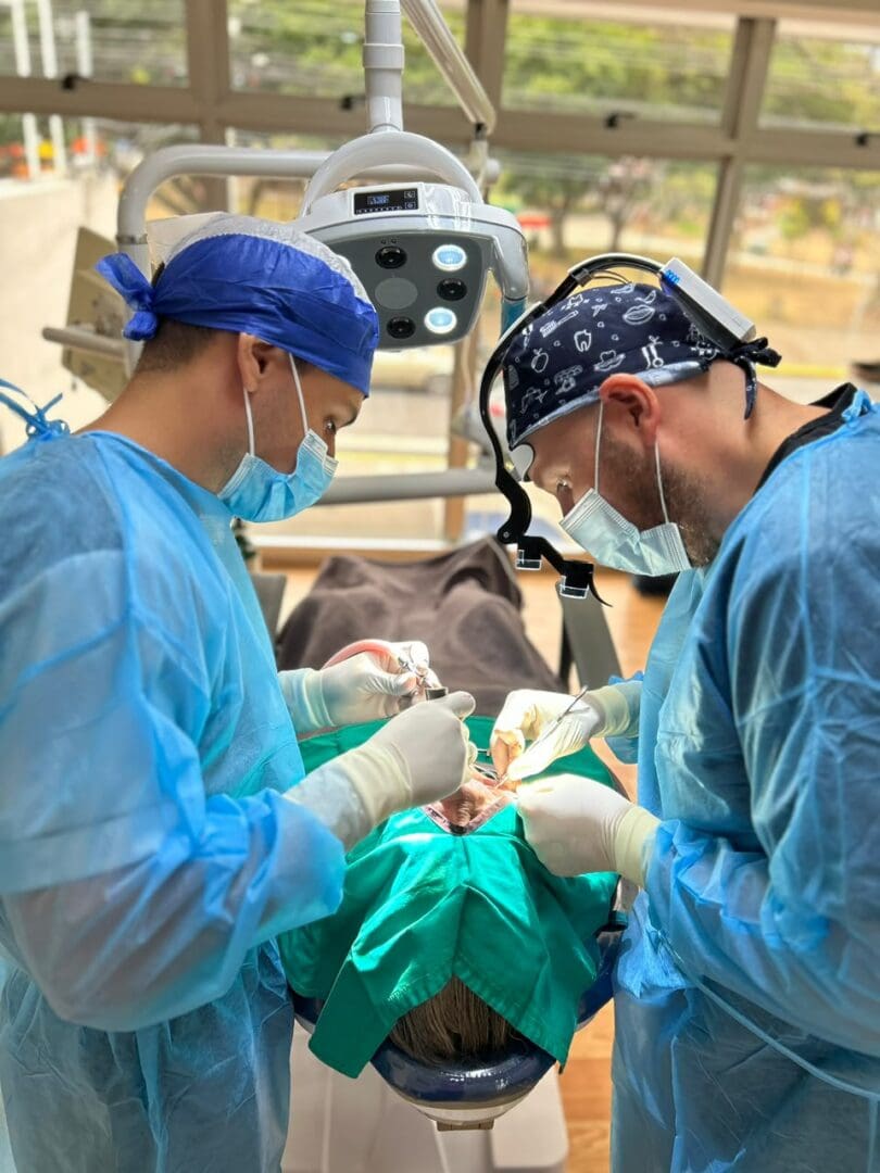 Surgeons performing a live case in the training operatory